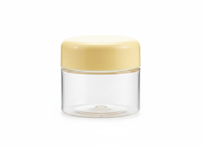 Round clear cream yellow lid plastic jar
