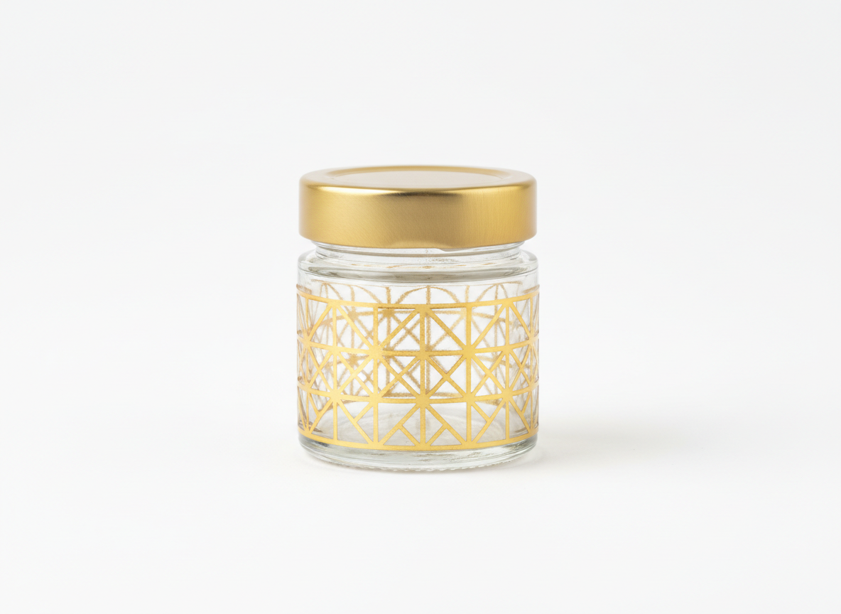 Clear gold patterned glass jar