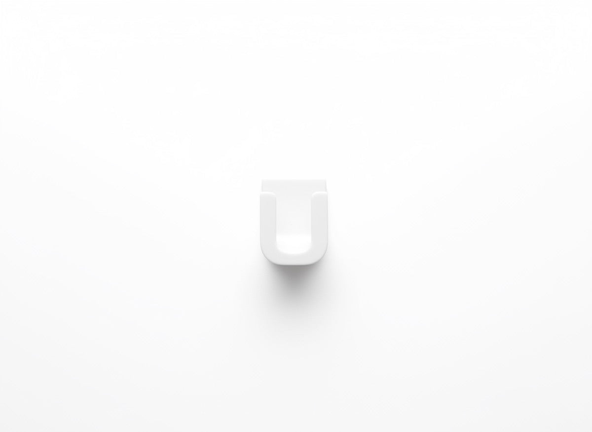 Plastic wall mounted eyeglass holder