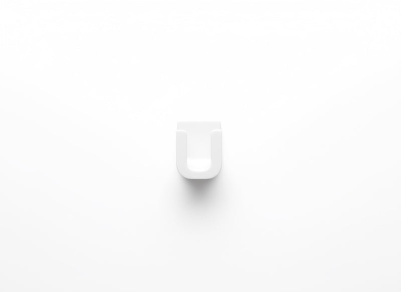 Plastic wall mounted eyeglass holder