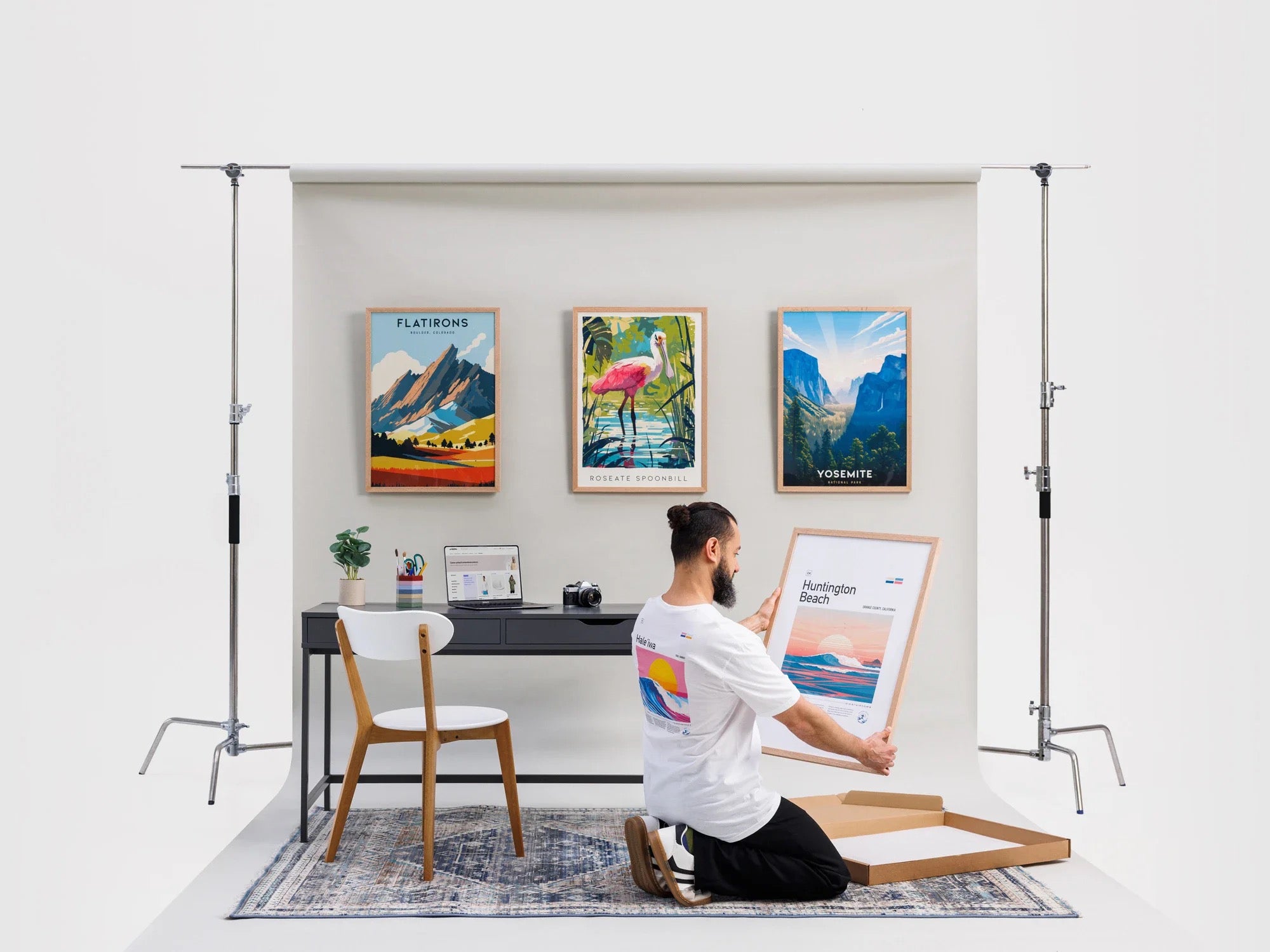 Studio backdrop, grey: framed posters and mailer box