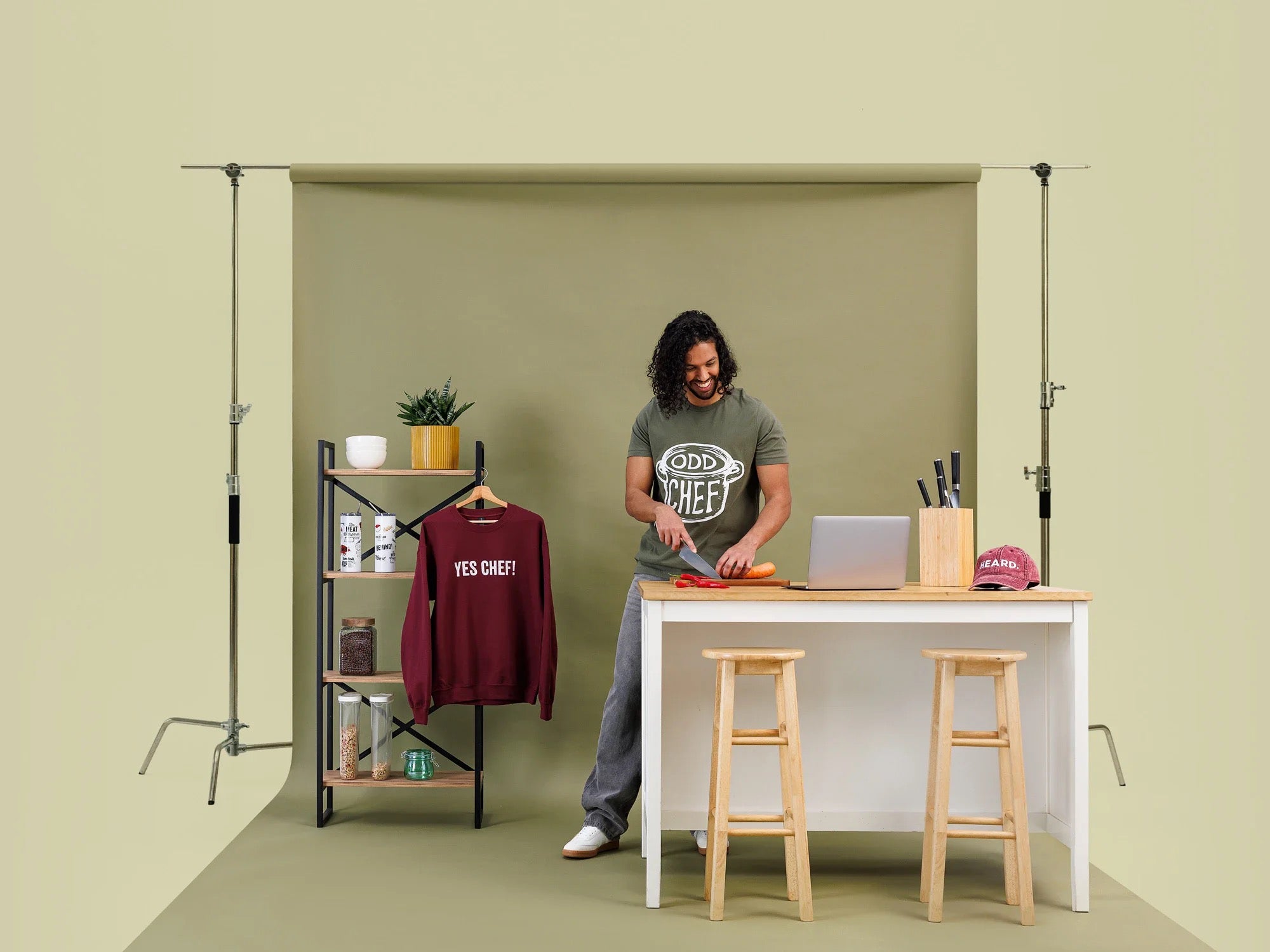 Studio backdrop, olive: chef tee, sweatshirt, tumblers and cap